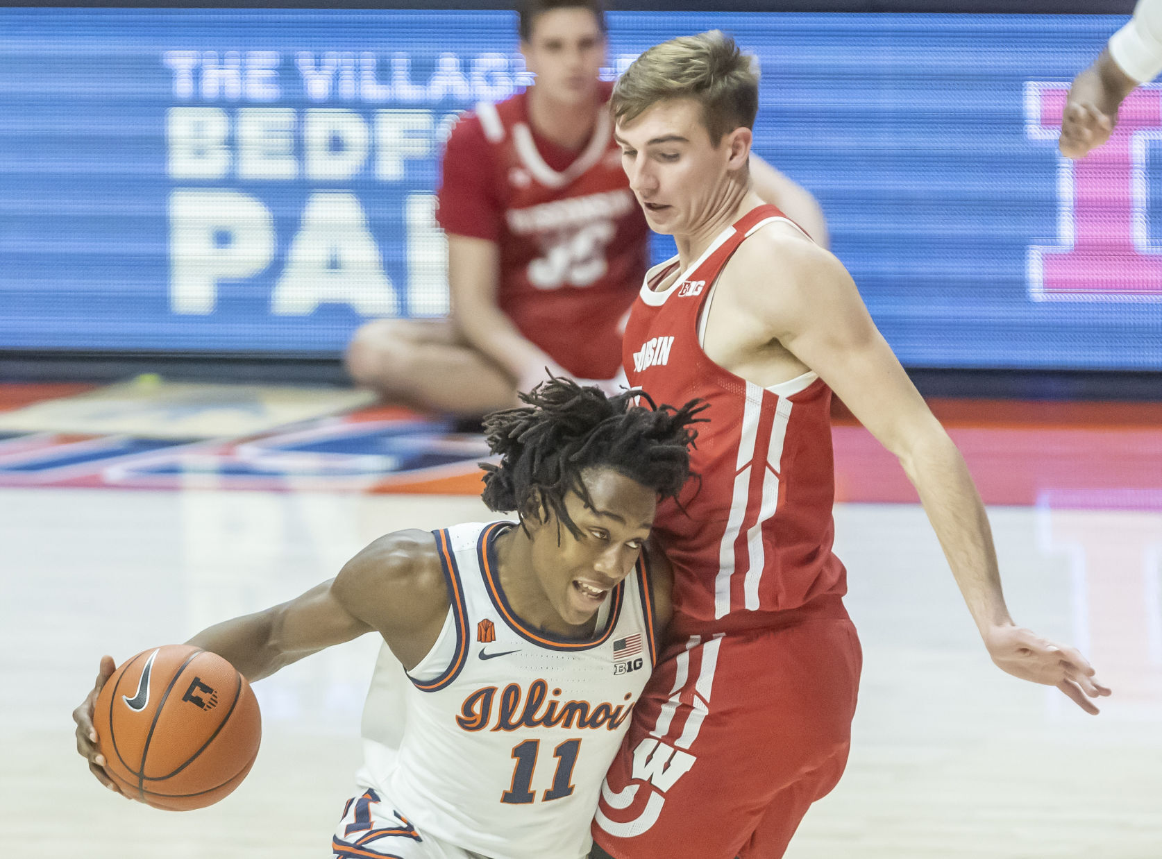 Illinois 75, UW 60